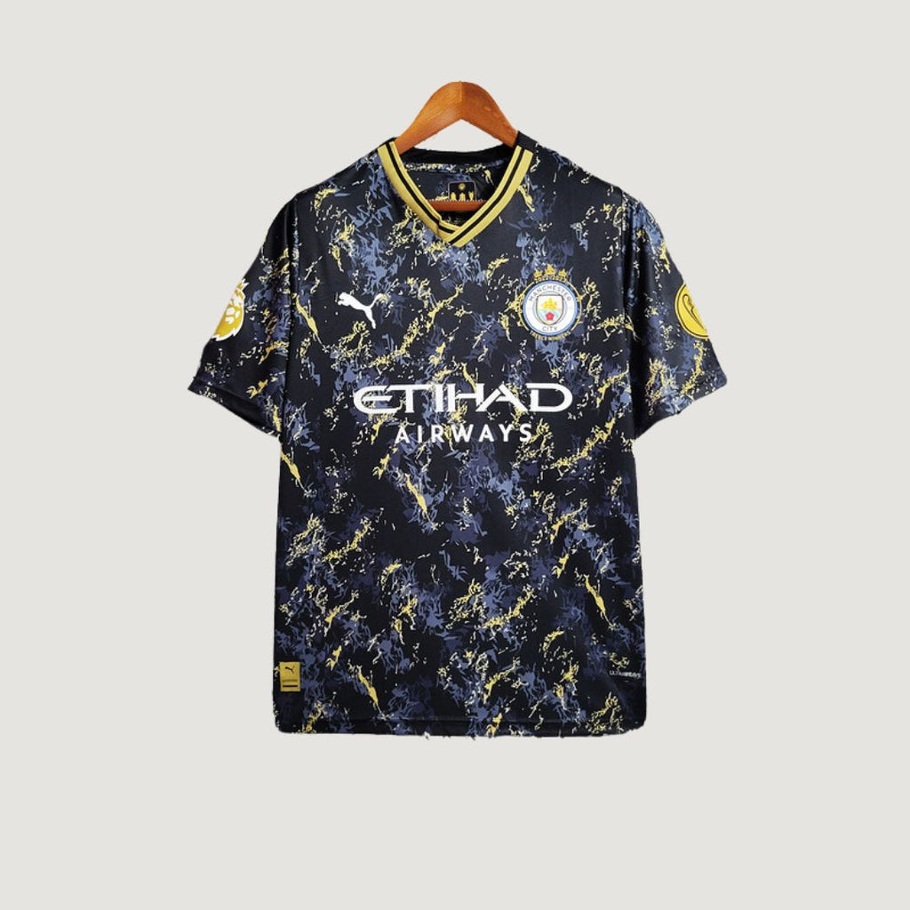 MANCHESTER CITY - MAILLOT ÉDITION SPÉCIALE 23/24 - NOIR ET OR